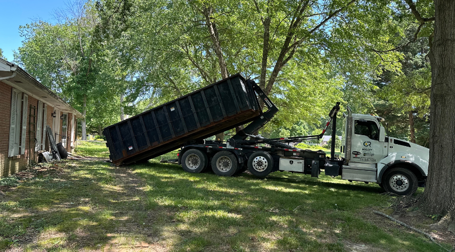 Complete Rolloff Services delivering a dumpster rental for a house renovation project